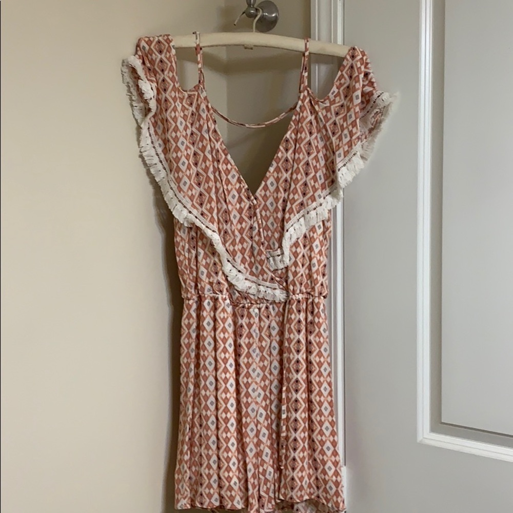 Sassy strappy cold shouldered romper